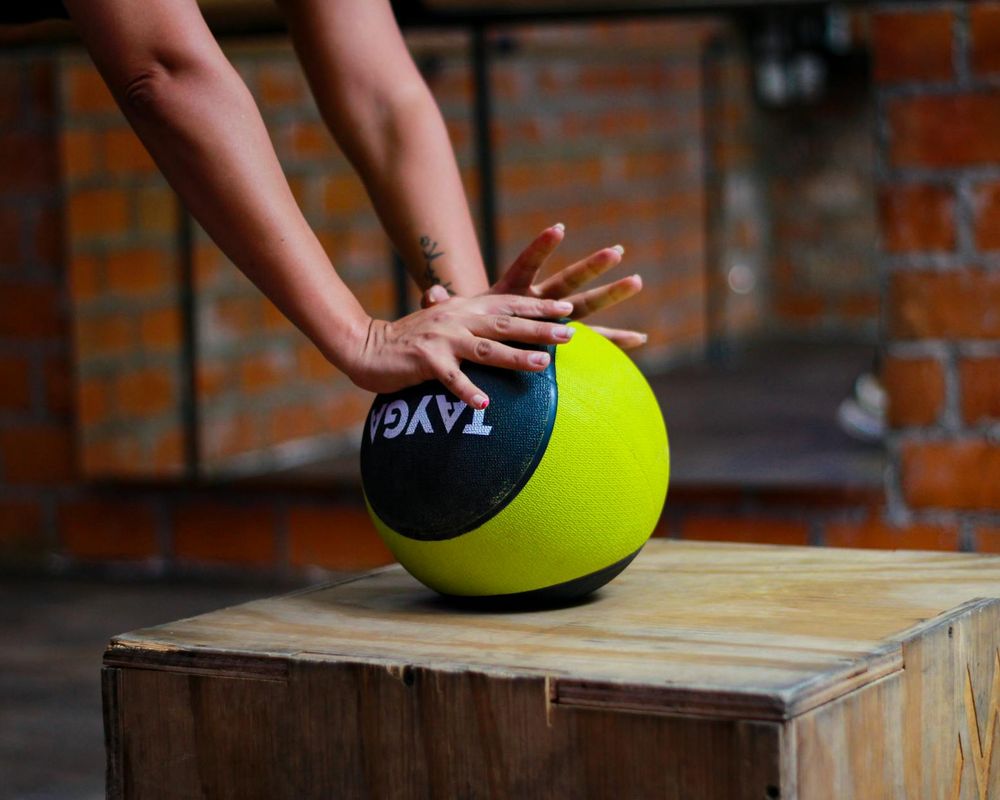 Close up of sports equipment and movement in gym.