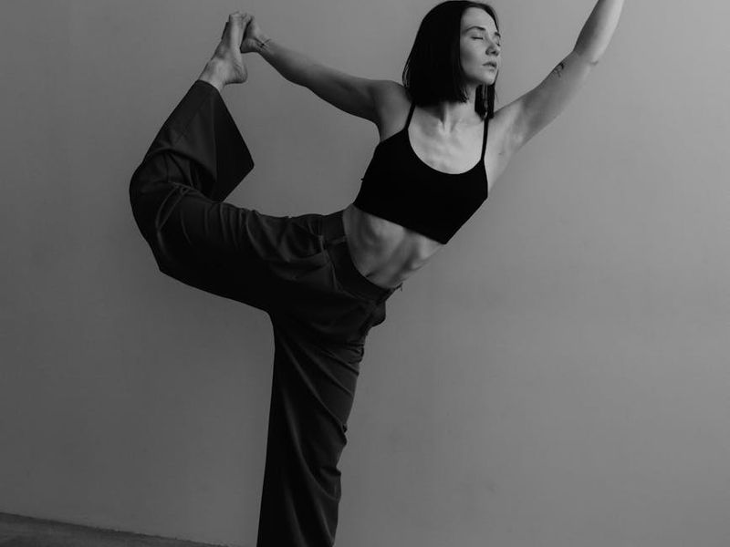 Wide view of a minimal exercise studio with natural light.